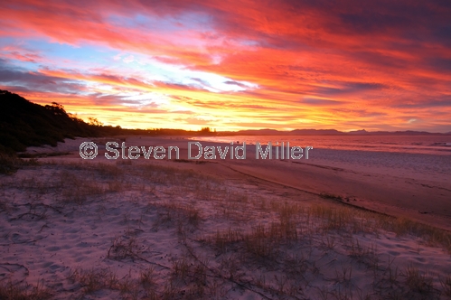 byron bay picture;byron bay;clarkes beach;byron bay sunset;ocean sunset;beach sunset;new south wales beach;new south wales;steven david miller;natural wanders