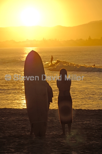 surfer;surfers;byron bay;byron bay surfer;surfer with surfboard;surfer at byron bay;clarkes beach;australian surfer;steven david miller;natural wanders;bryon bay sunset;surfers at sunset